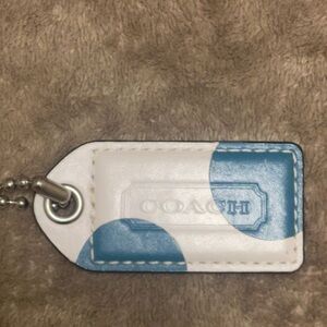 Coach White and Blue Leather Tag